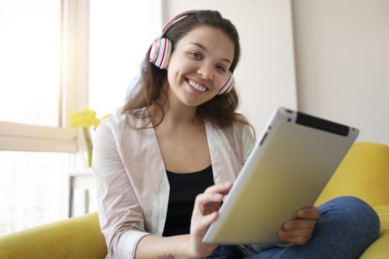 young-woman-enjoying-listening-music